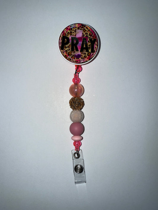 Badge Reel Pray